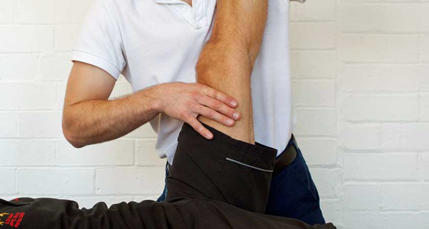 Craig Brown, CBPhysio with a client - understanding knee pain