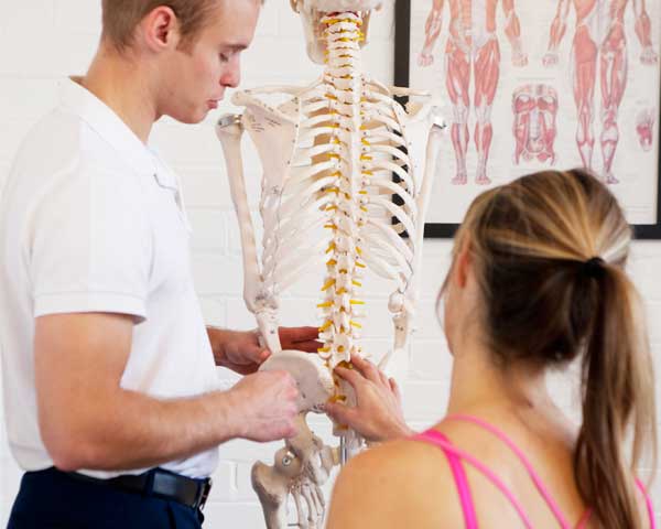 CBPhysio explaining a back condition to a client